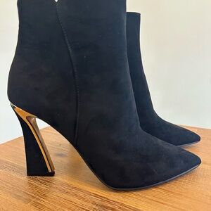 JLo Gorgina Booties - Chic Black Boots with Gold-Trimmed Heel